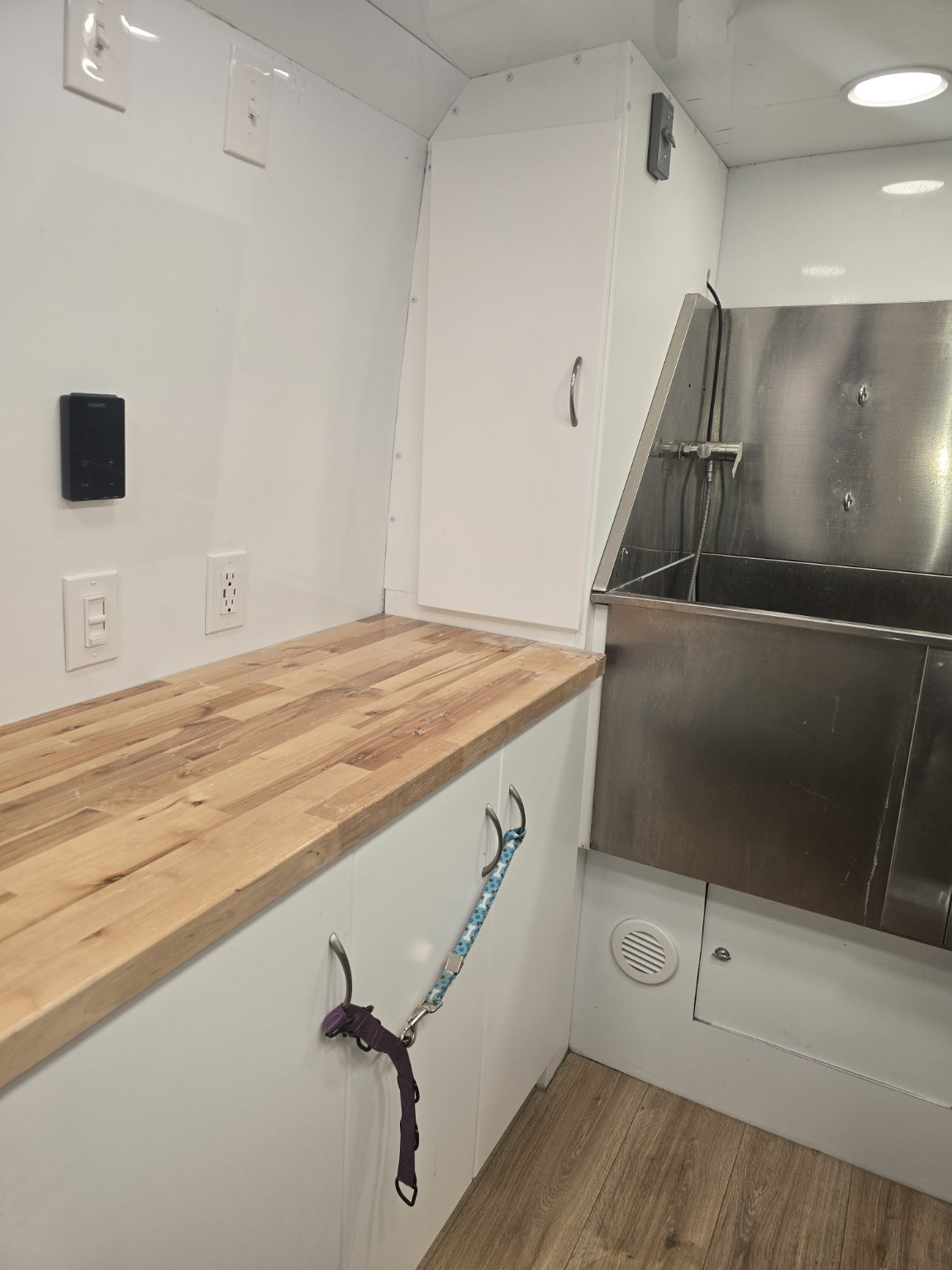 Countertop and cabinetry inside grooming van
